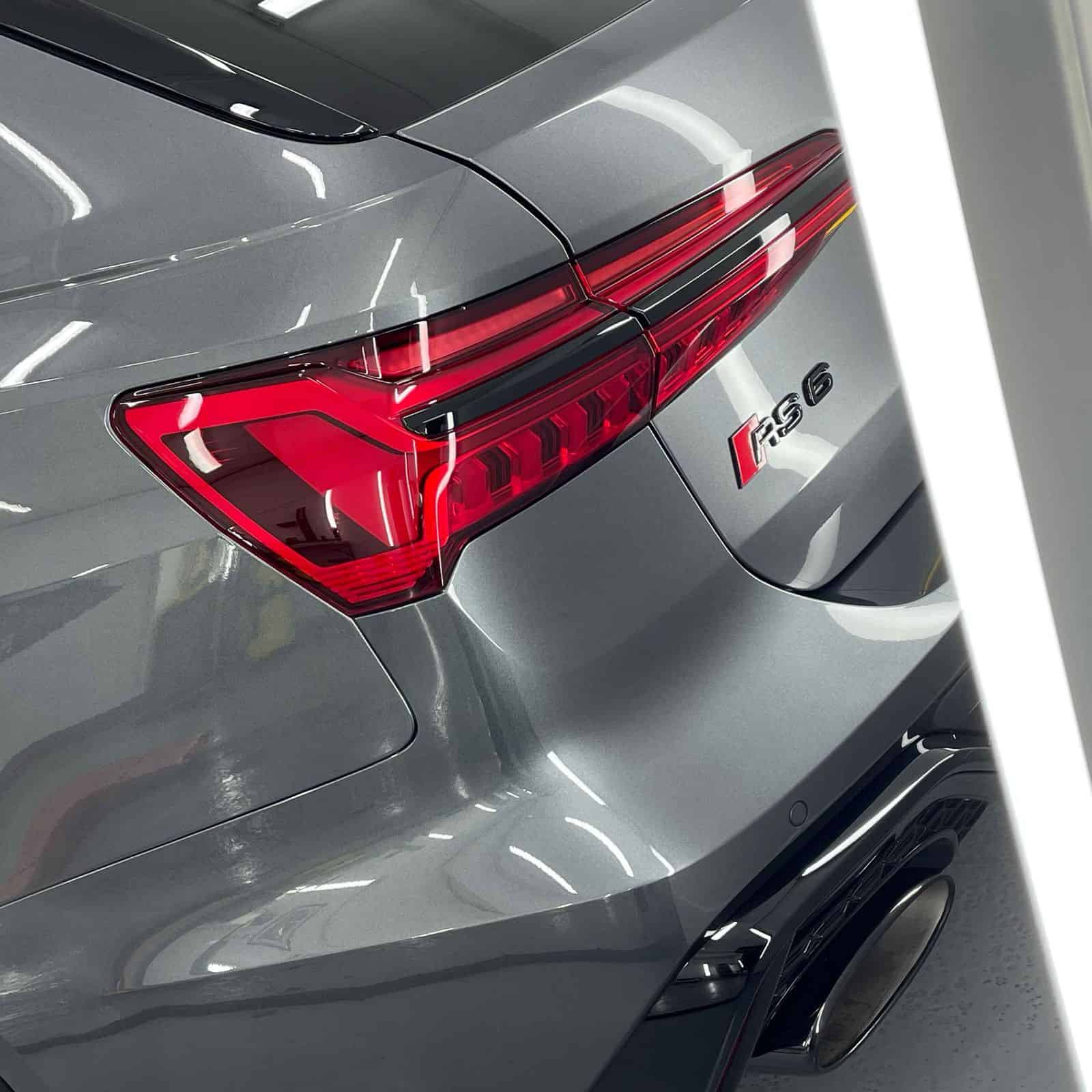 The rear of an Audi RS6 Avant after Gyeon ceramic coating being applied