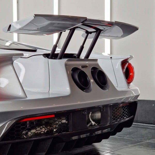The rear of a silver Ford GT, showing the glossy finish of Xpel Fusion Plus paint protection film ceramic coating.